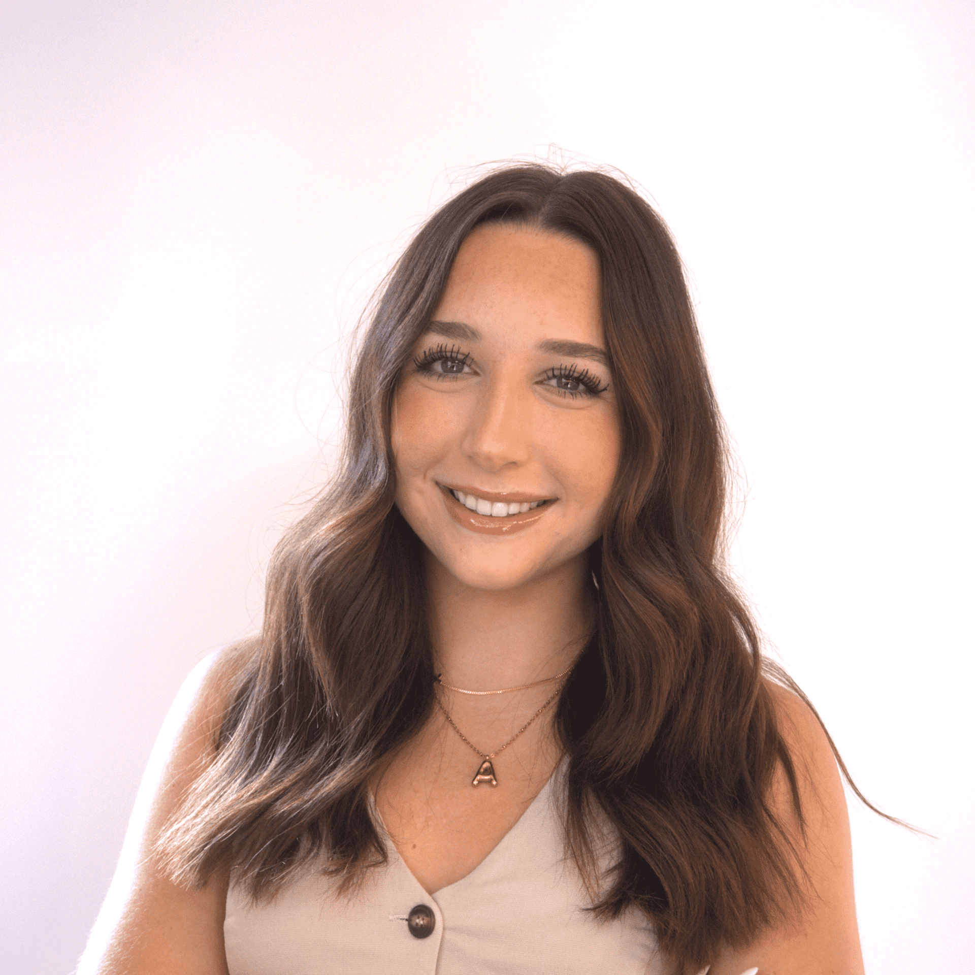 Portrait of Ava Joy, a professional stylist at Western Blonde Salon, showcasing their expertise and style.