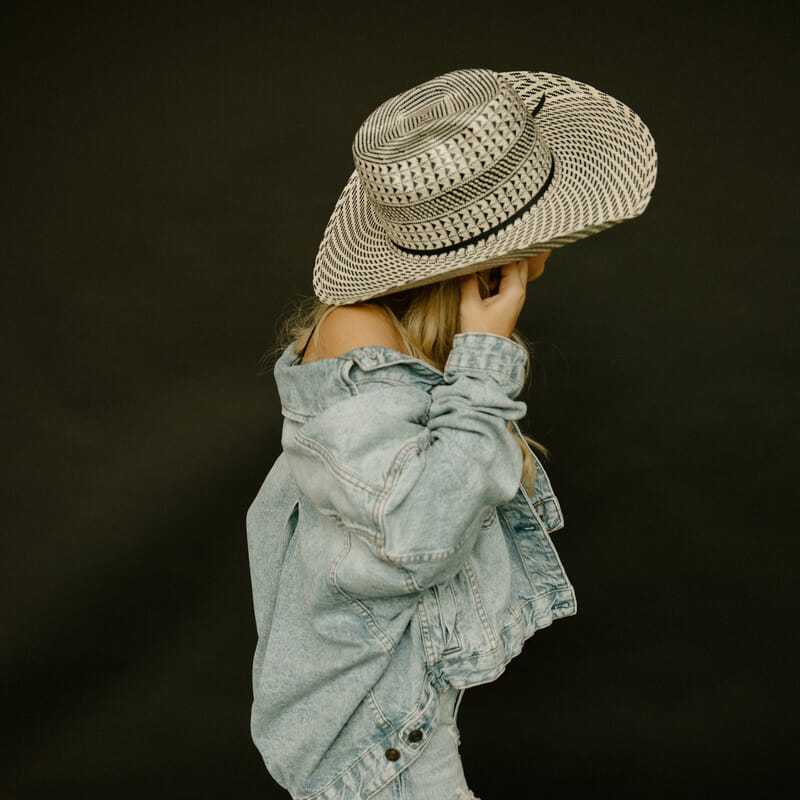 Portrait of Kaylea, a professional stylist at Western Blonde Salon, showcasing their expertise and style.