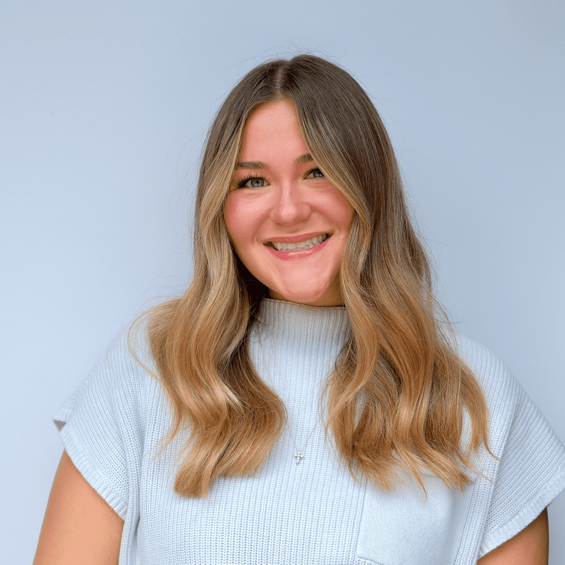 Portrait of Abby, a professional stylist at Western Blonde Salon, showcasing their expertise and style.