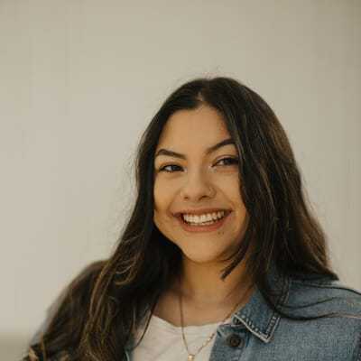 Portrait of Emily, a professional stylist at Western Blonde Salon, showcasing their expertise and style.