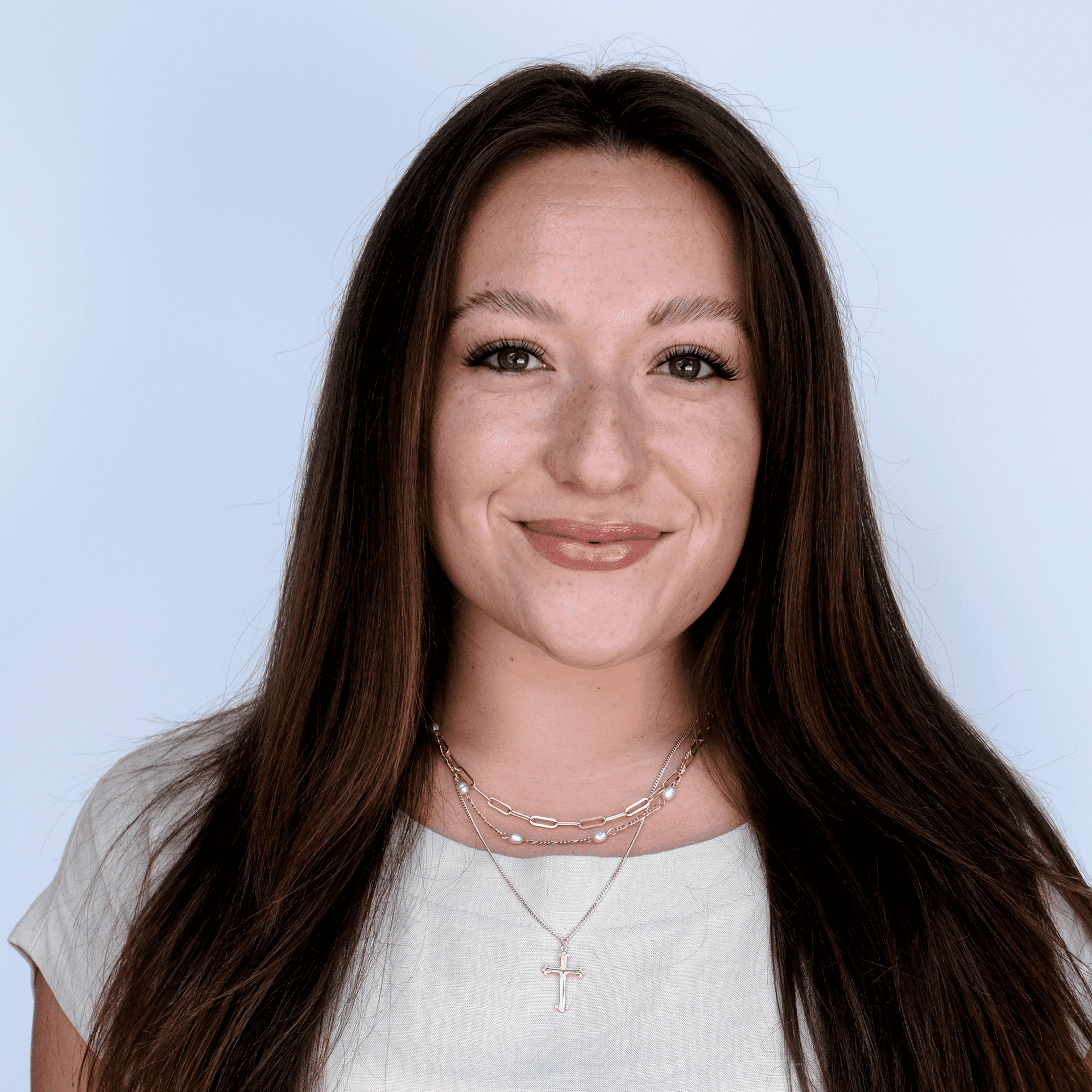 Portrait of Maddie, a professional stylist at Western Blonde Salon, showcasing their expertise and style.